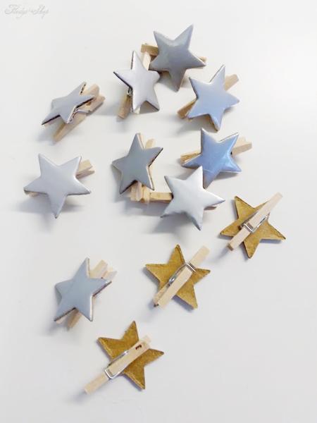 12 Holzklammern mit silbernem Stern